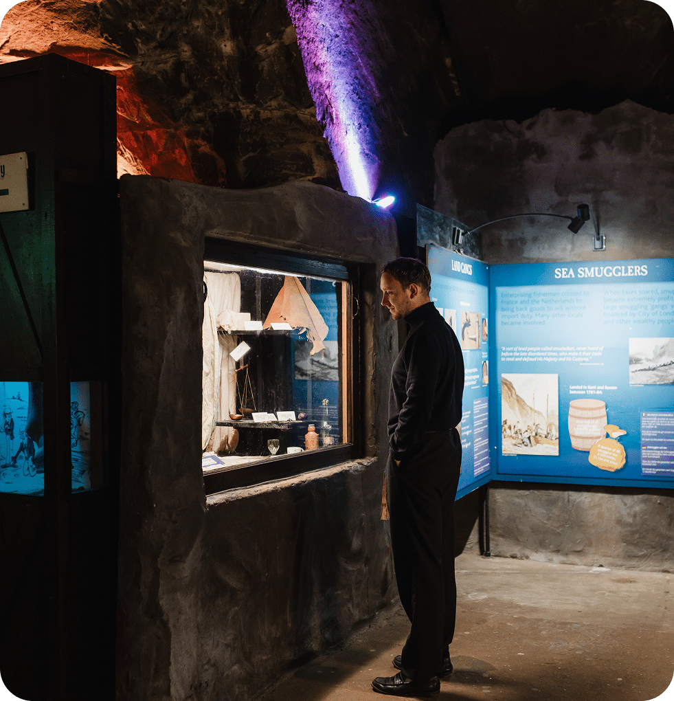 a-man-looking-into-exhibition__mobile